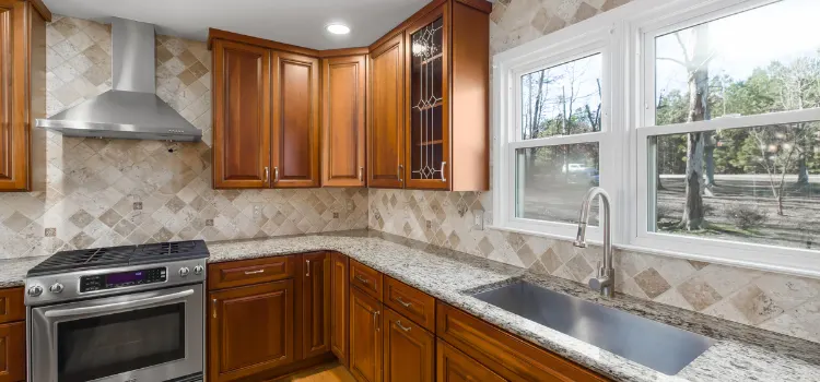 How to Reattach a Delta Kitchen Faucet Sprayer Thumb Control